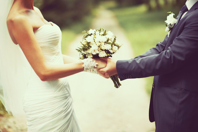 Young wedding couple. Groom and bride together.